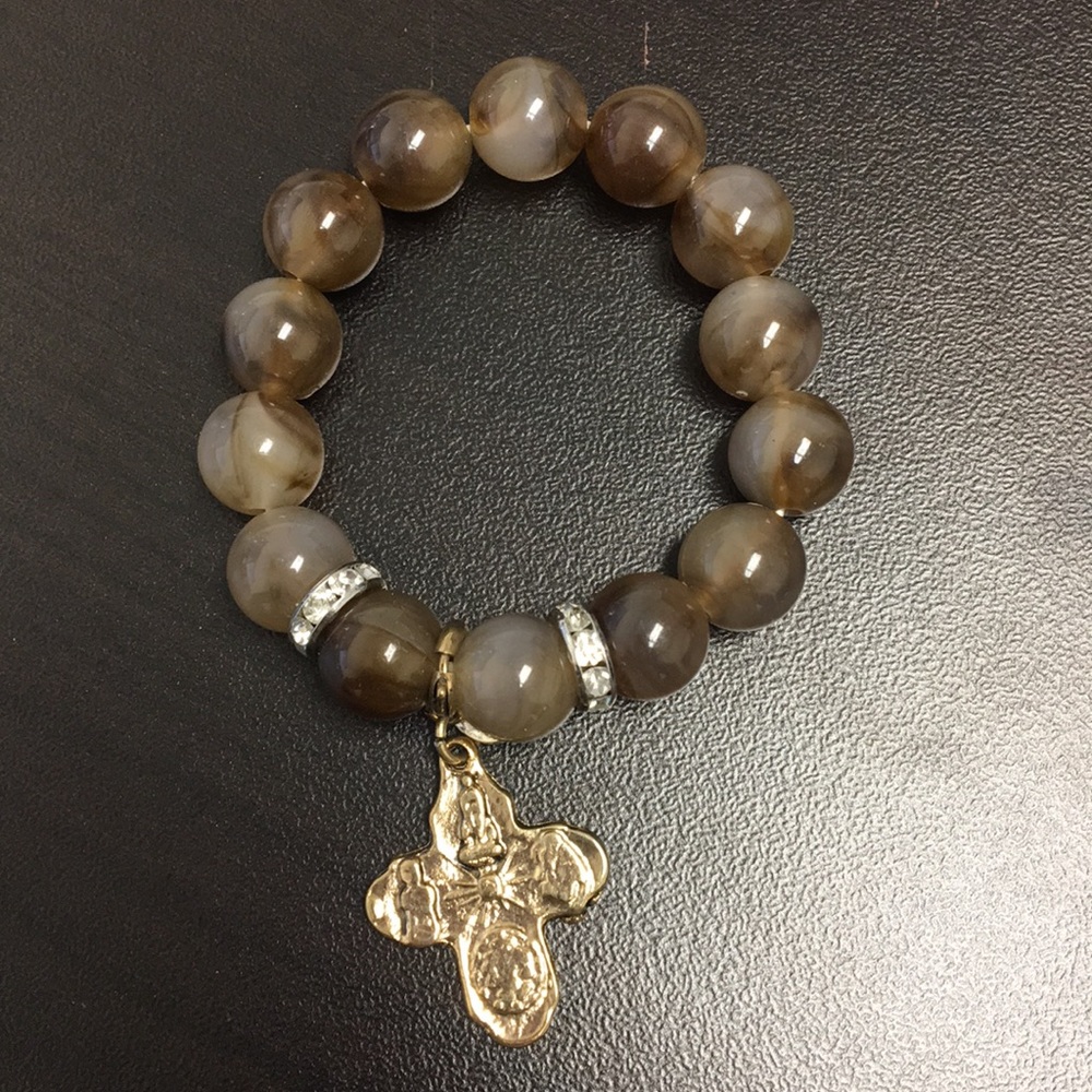 Beautiful brown bead bracelet with cross charm